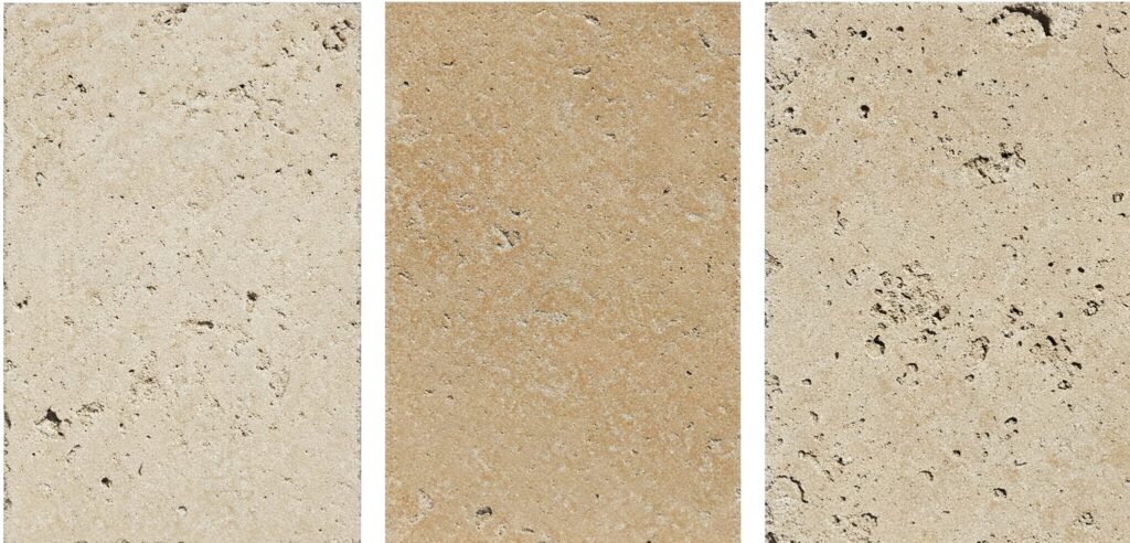 Three travertine pavers in different quality grades