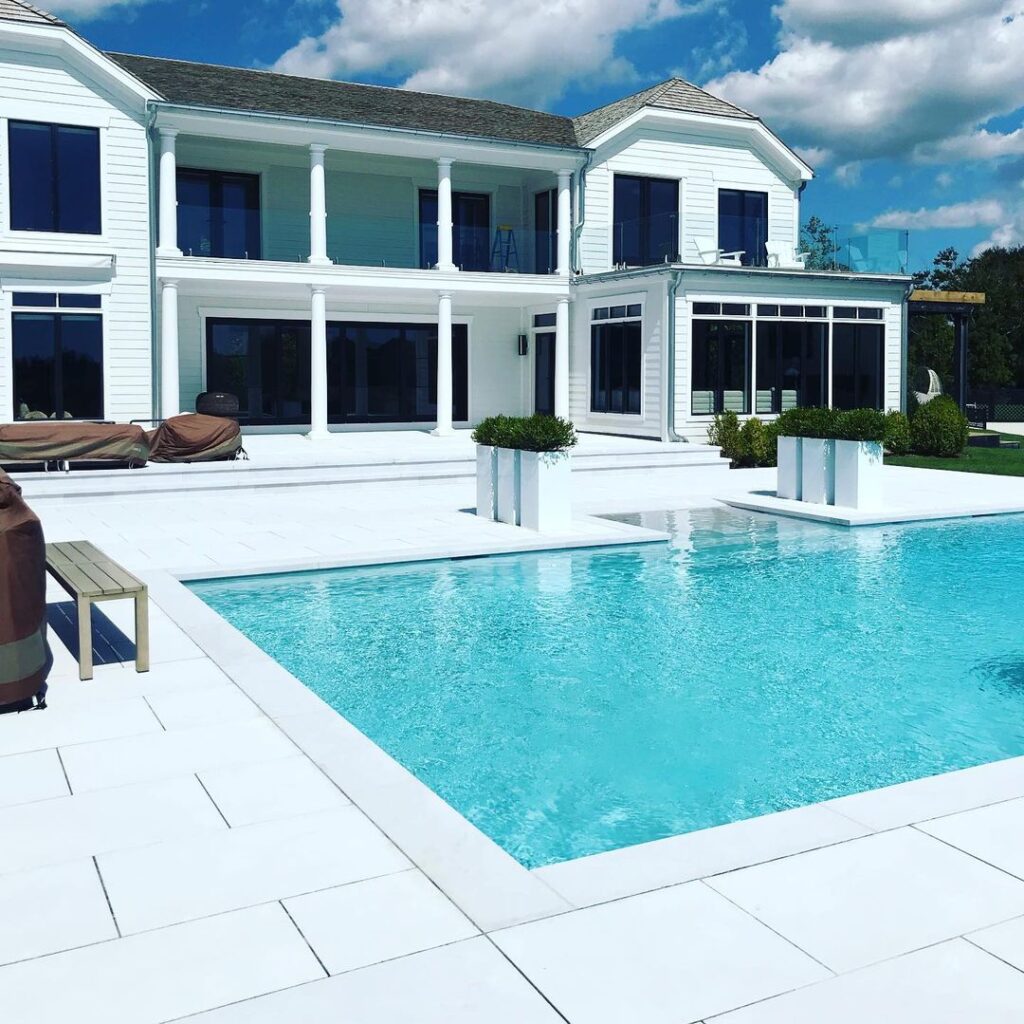 Ice White marble pavers on a pool patio