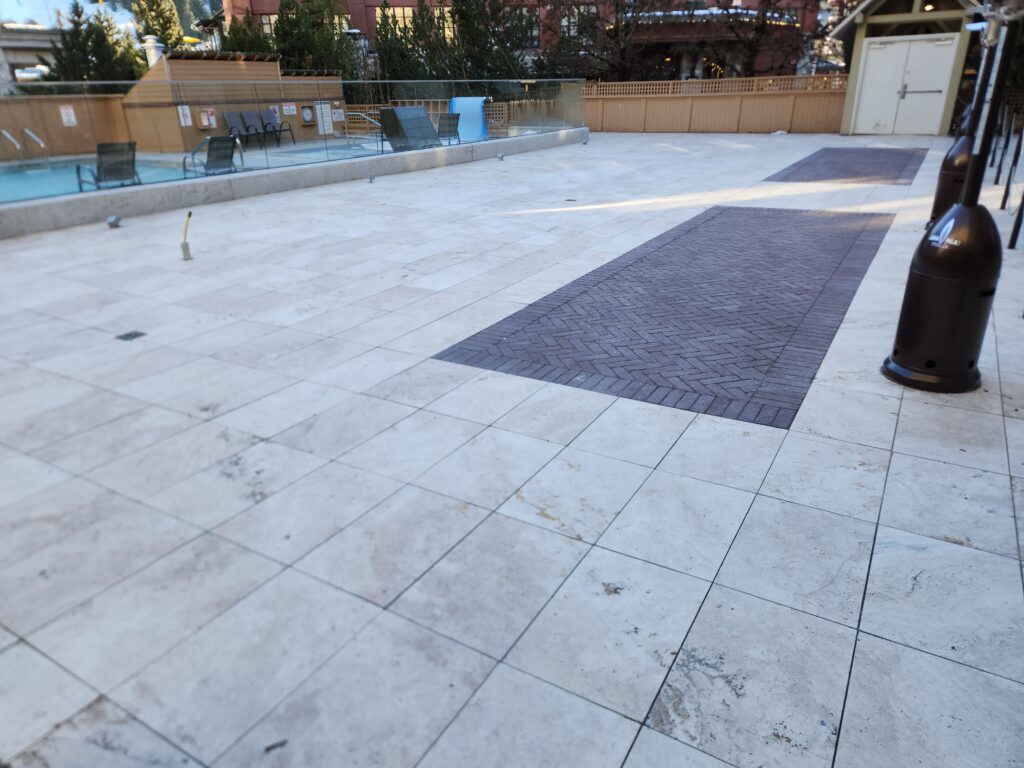 Ivory Travertine Pavers on a Pool Deck